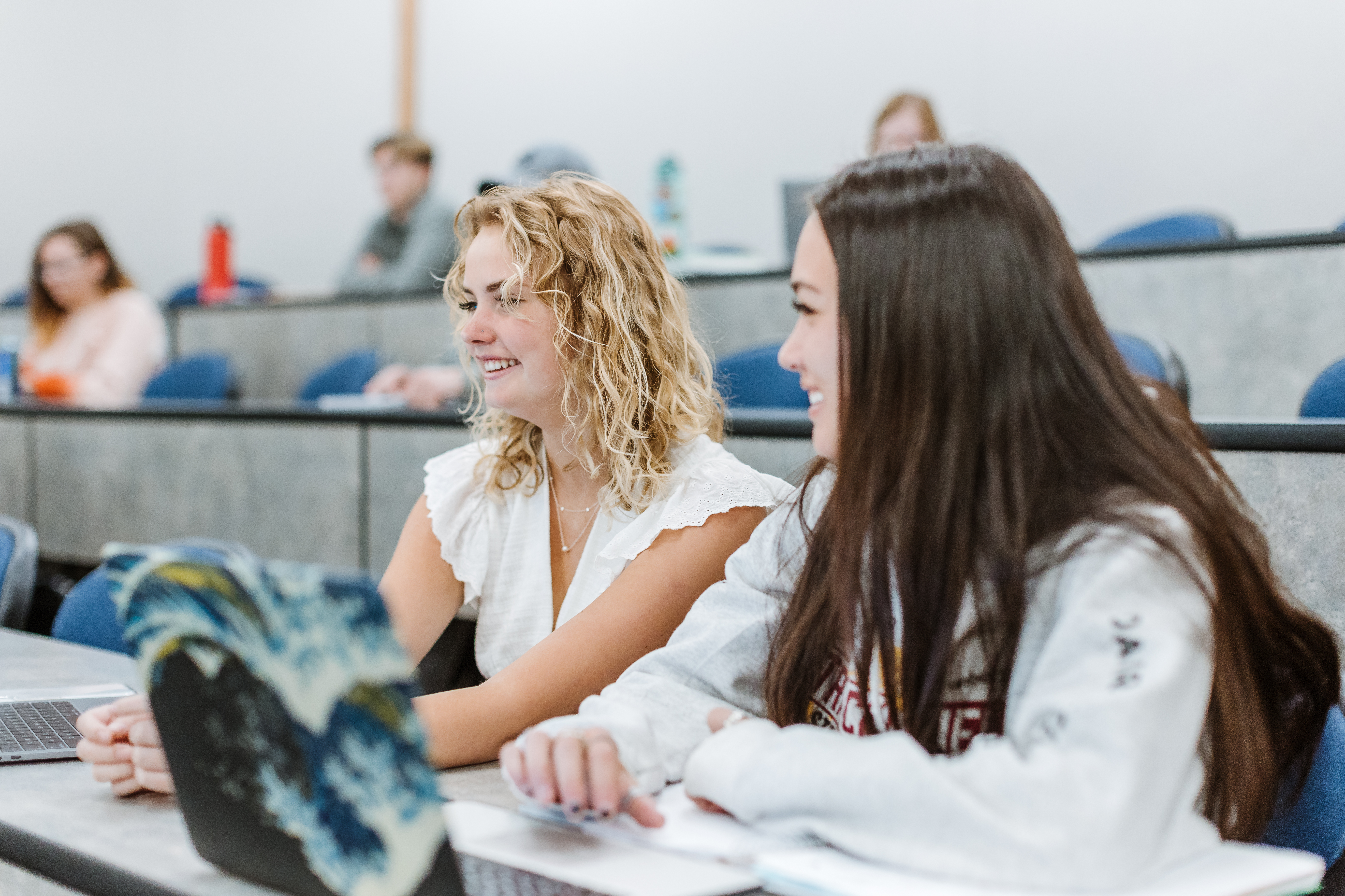 students laughing in class