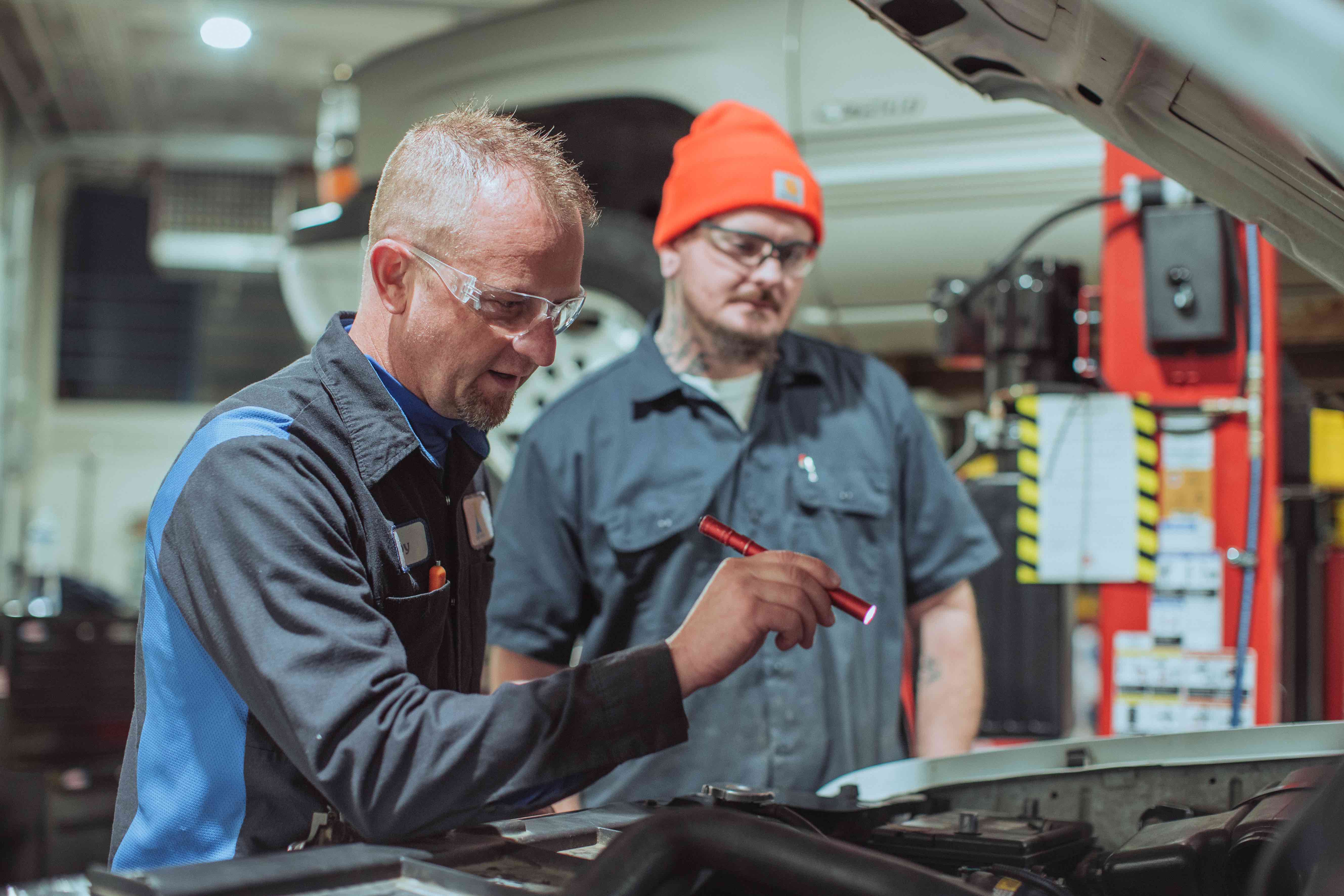 Students working on a vehicle