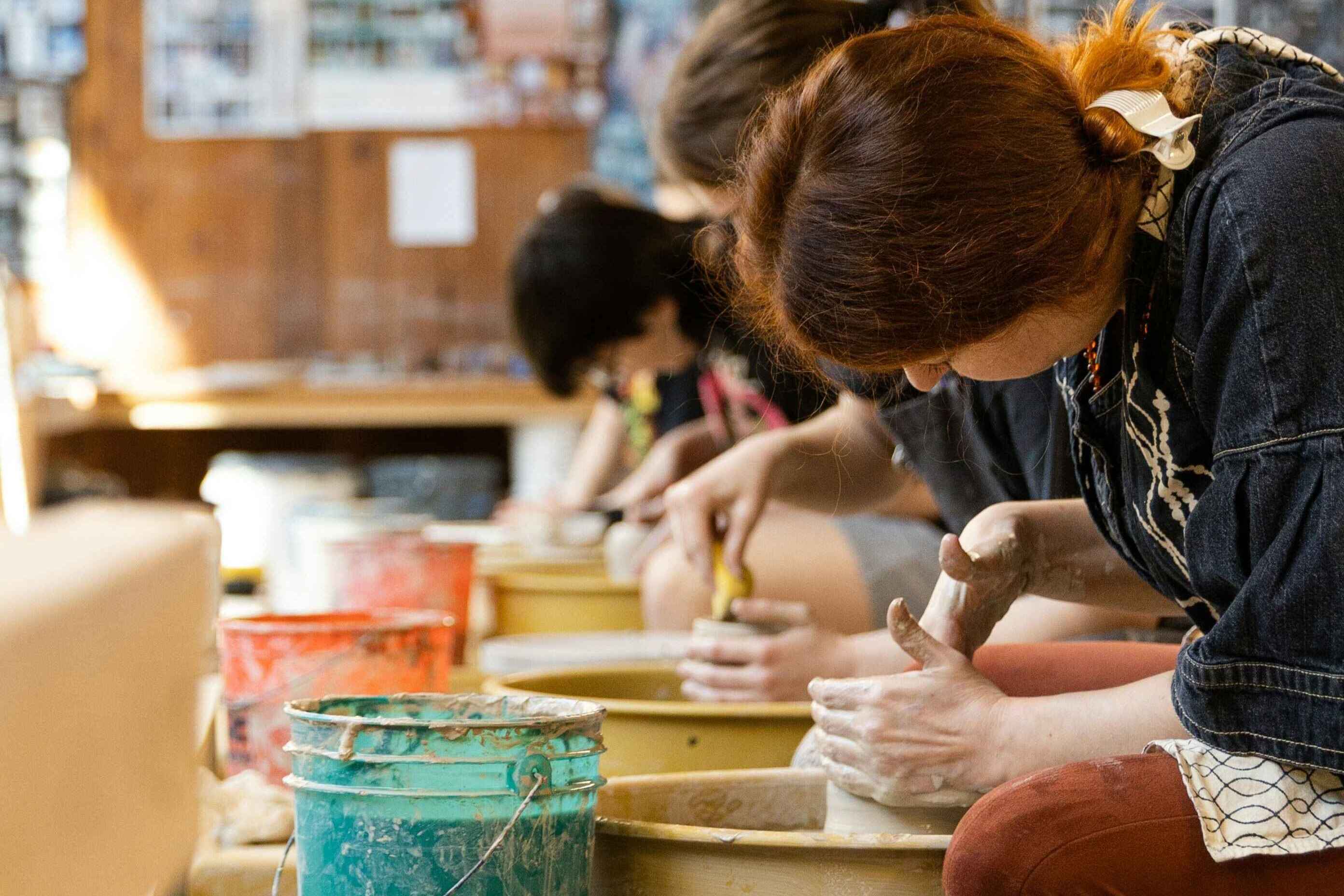 Students doing pottery