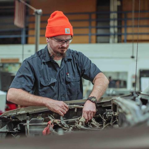 Mechanic student working on a project