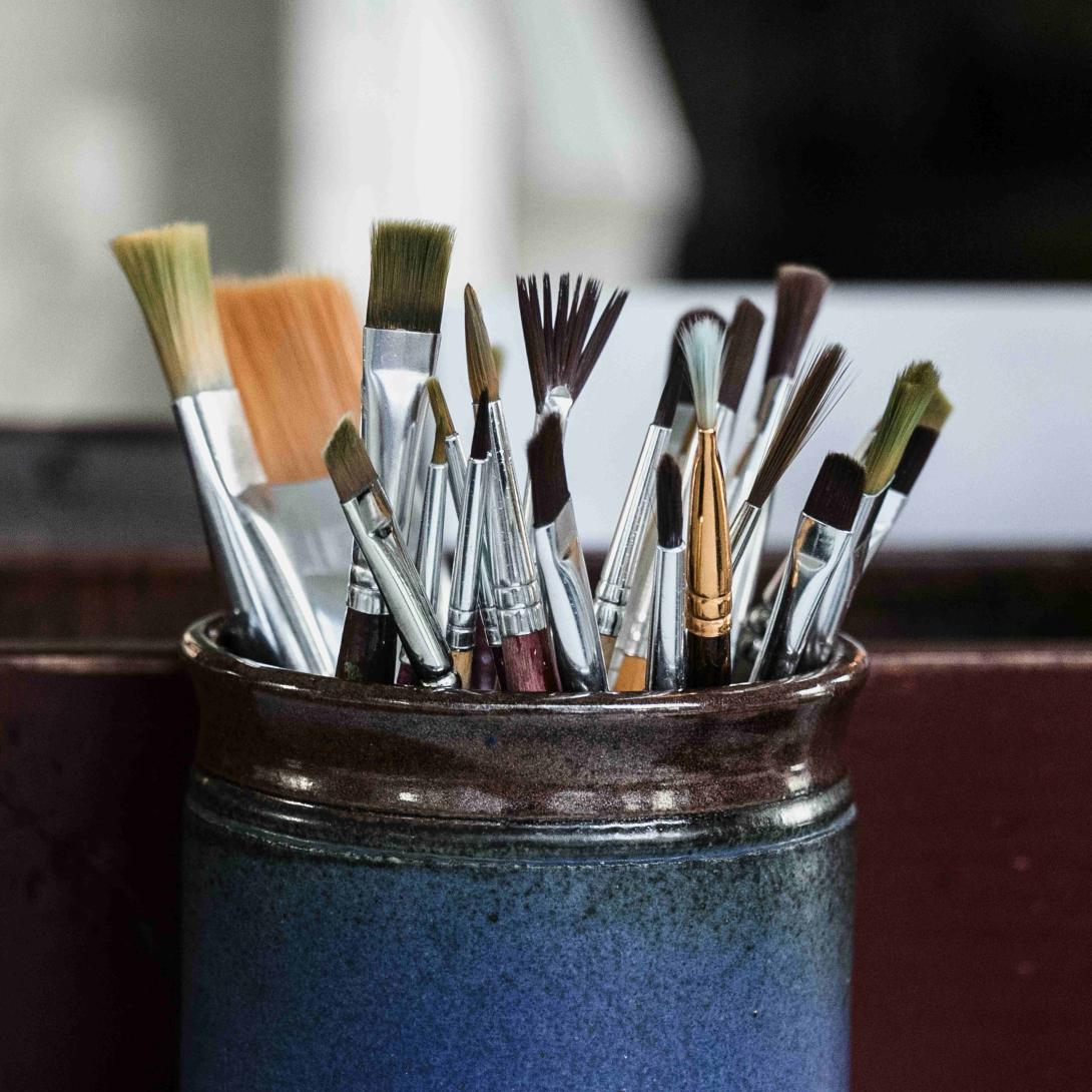 Jar of paintbrushes